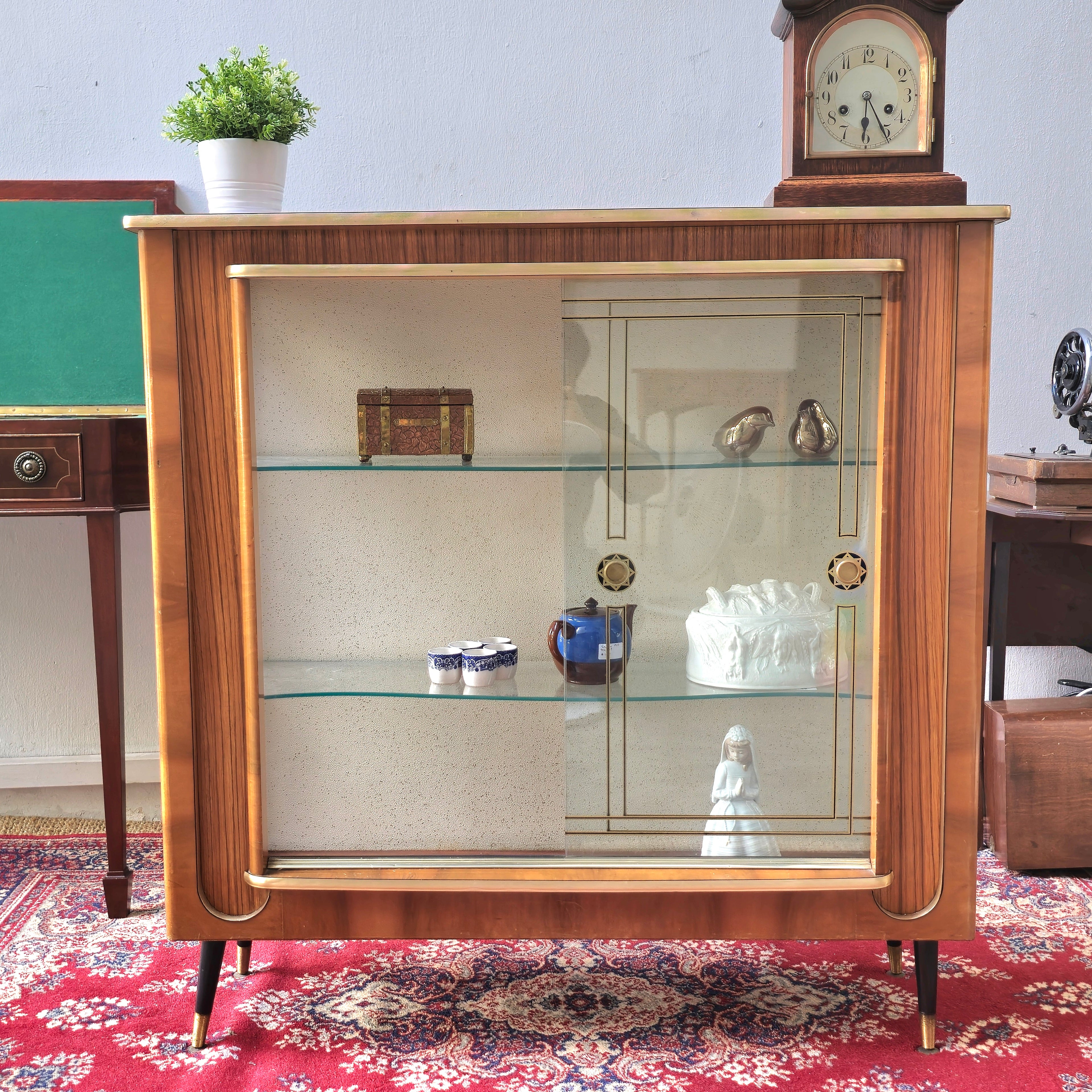 Vintage English display cabinet with teak compass legs, 1970