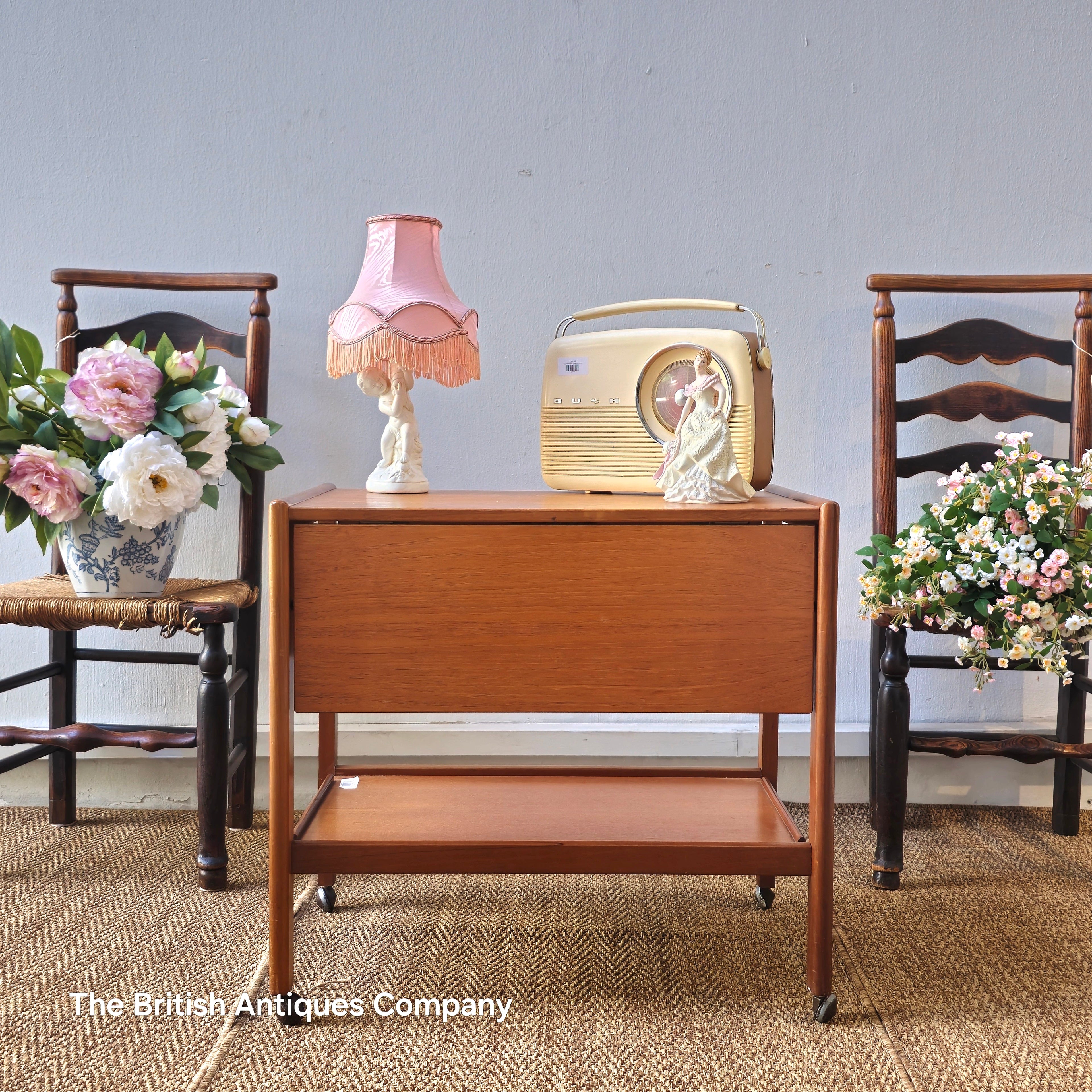 Mid-century drop leaf trolley table on casters wheel