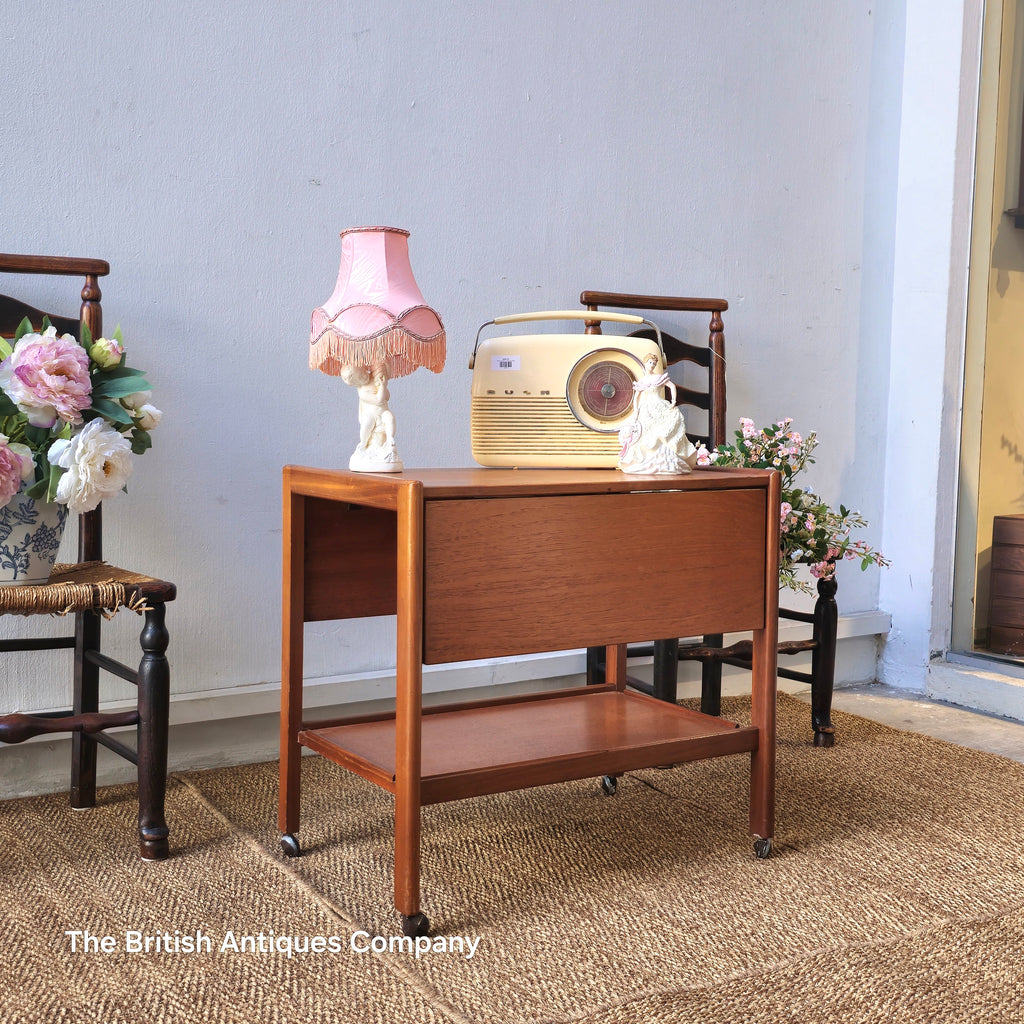 Mid-century drop leaf trolley table on casters wheel