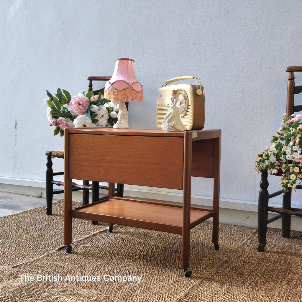 Mid-century drop leaf trolley table on casters wheel