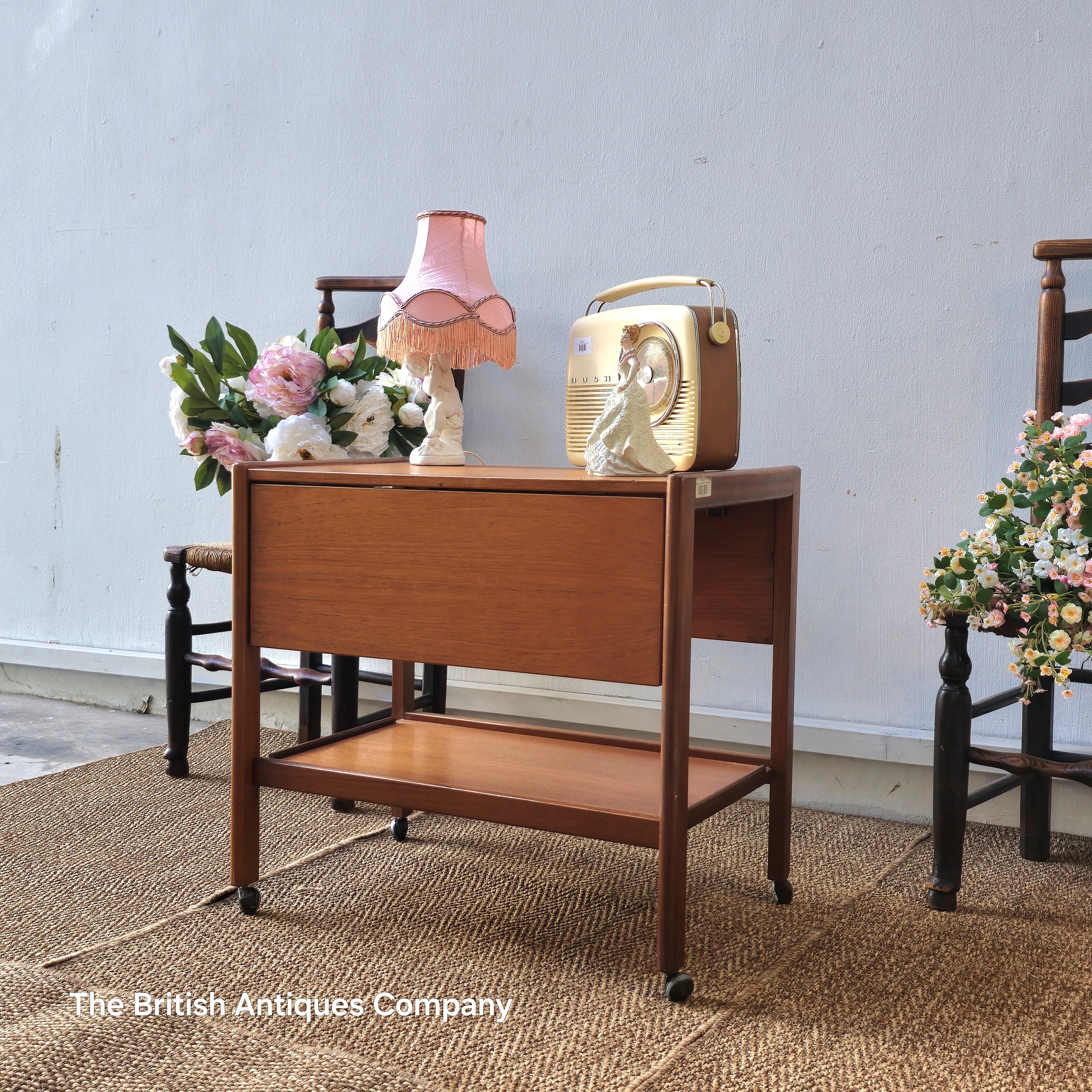 Mid-century drop leaf trolley table on casters wheel