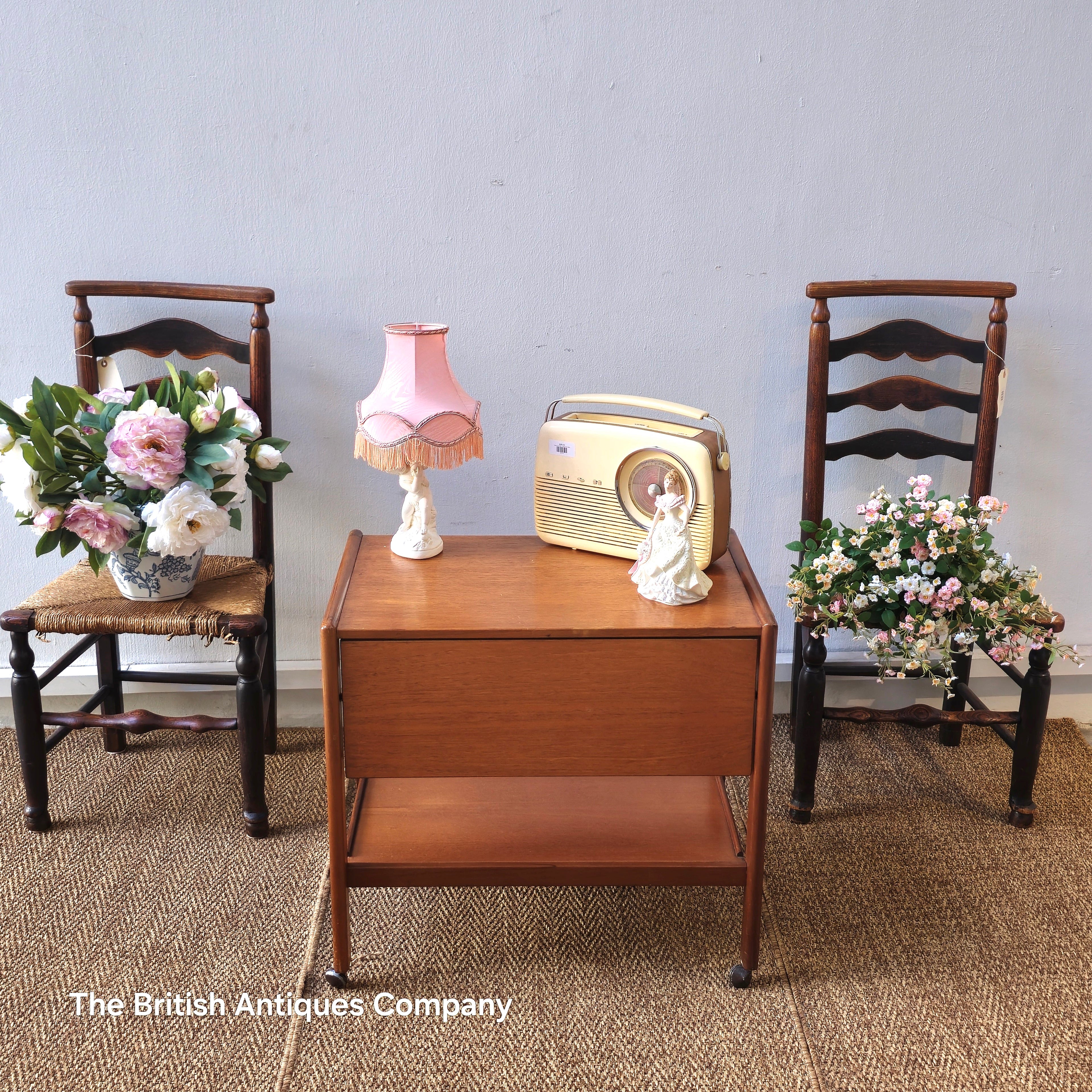Mid-century drop leaf trolley table on casters wheel