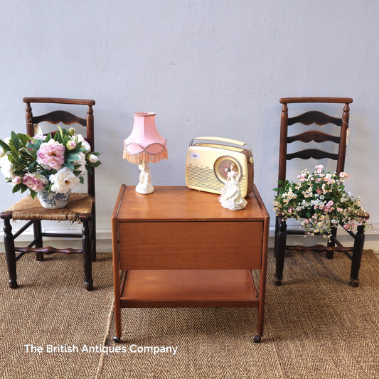 Mid-century drop leaf trolley table on casters wheel