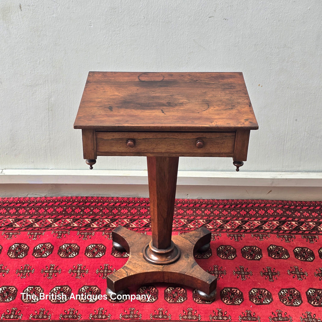 A VICTORIAN ROSEWOOD PEDESTAL CENTRE TABLE WITH SINGLE DRAWER ON BUN FEET, 21.5" X 17"