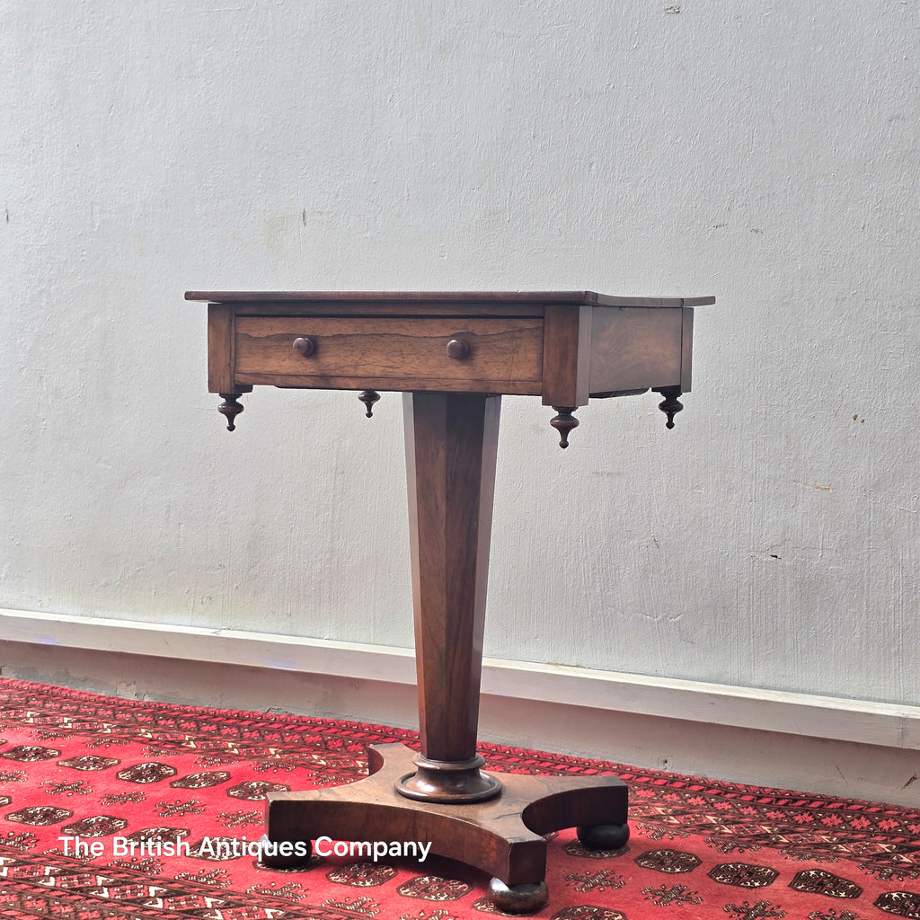 A VICTORIAN ROSEWOOD PEDESTAL CENTRE TABLE WITH SINGLE DRAWER ON BUN FEET, 21.5" X 17"