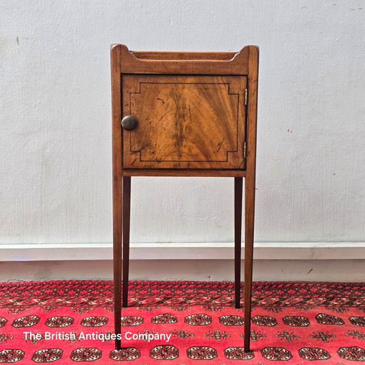 A 19TH CENTURY STYLE MAHOGANY TWO DRAWER SIDE TABLE ON TAPERING LEGS WITH SPADE FEET, 25" WIDE