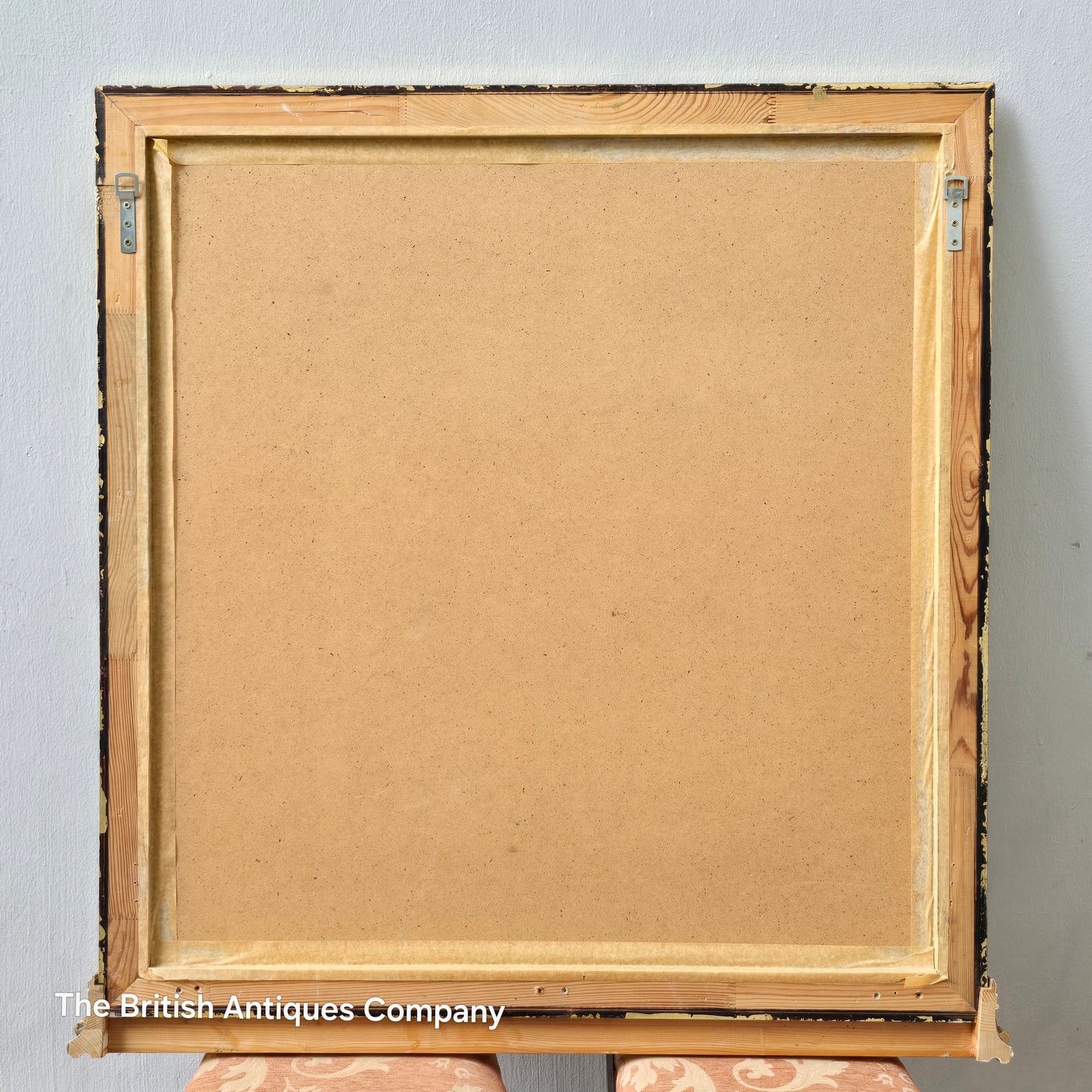 A 19TH CENTURY GILT WALL MIRROR WITH BEVEL EDGE AND DECORATED WITH SWAGS, 47" X 38"