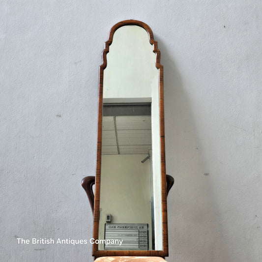 A MID 20TH CENTURY WALNUT MIRROR, 50" X 14"