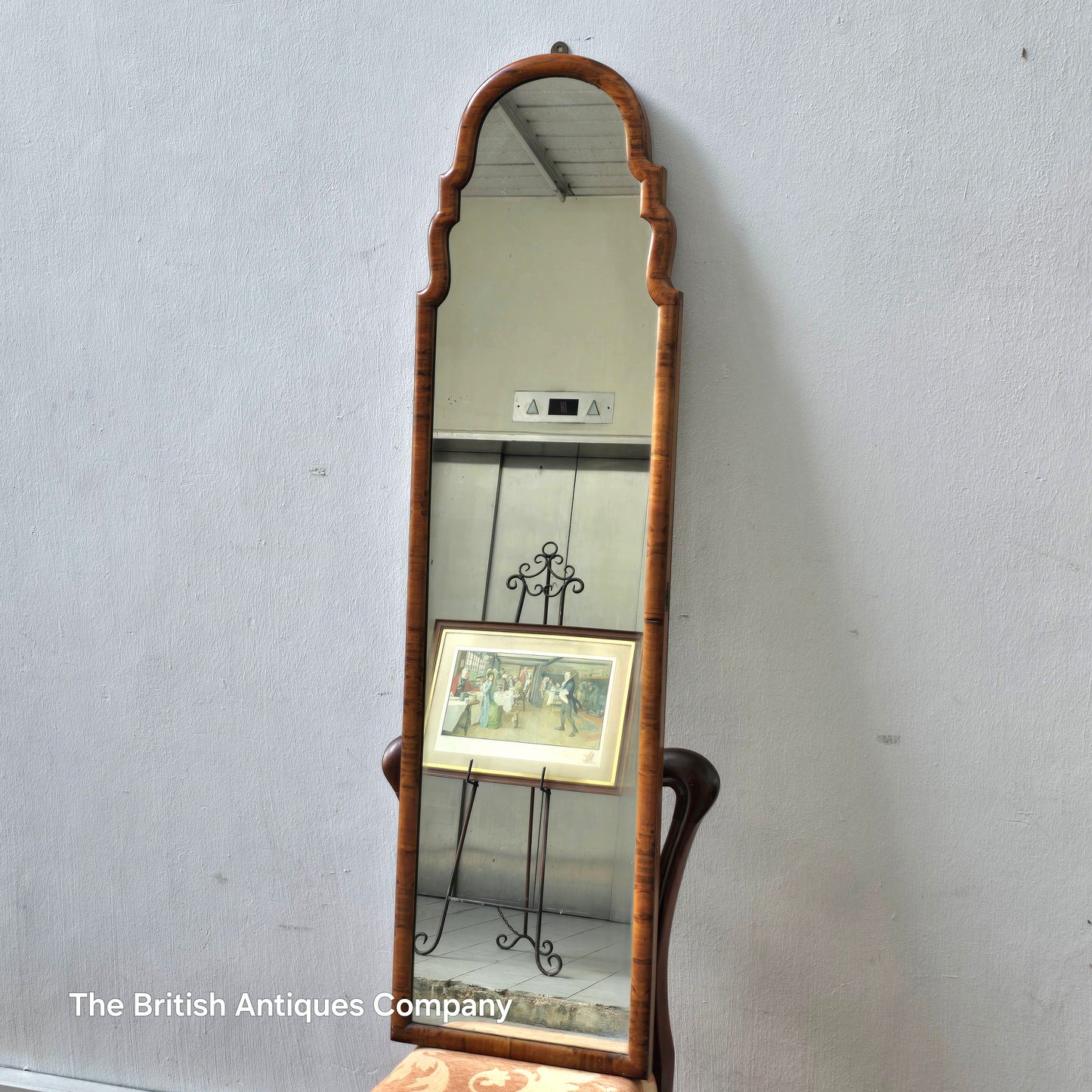 A MID 20TH CENTURY WALNUT MIRROR, 50" X 14"