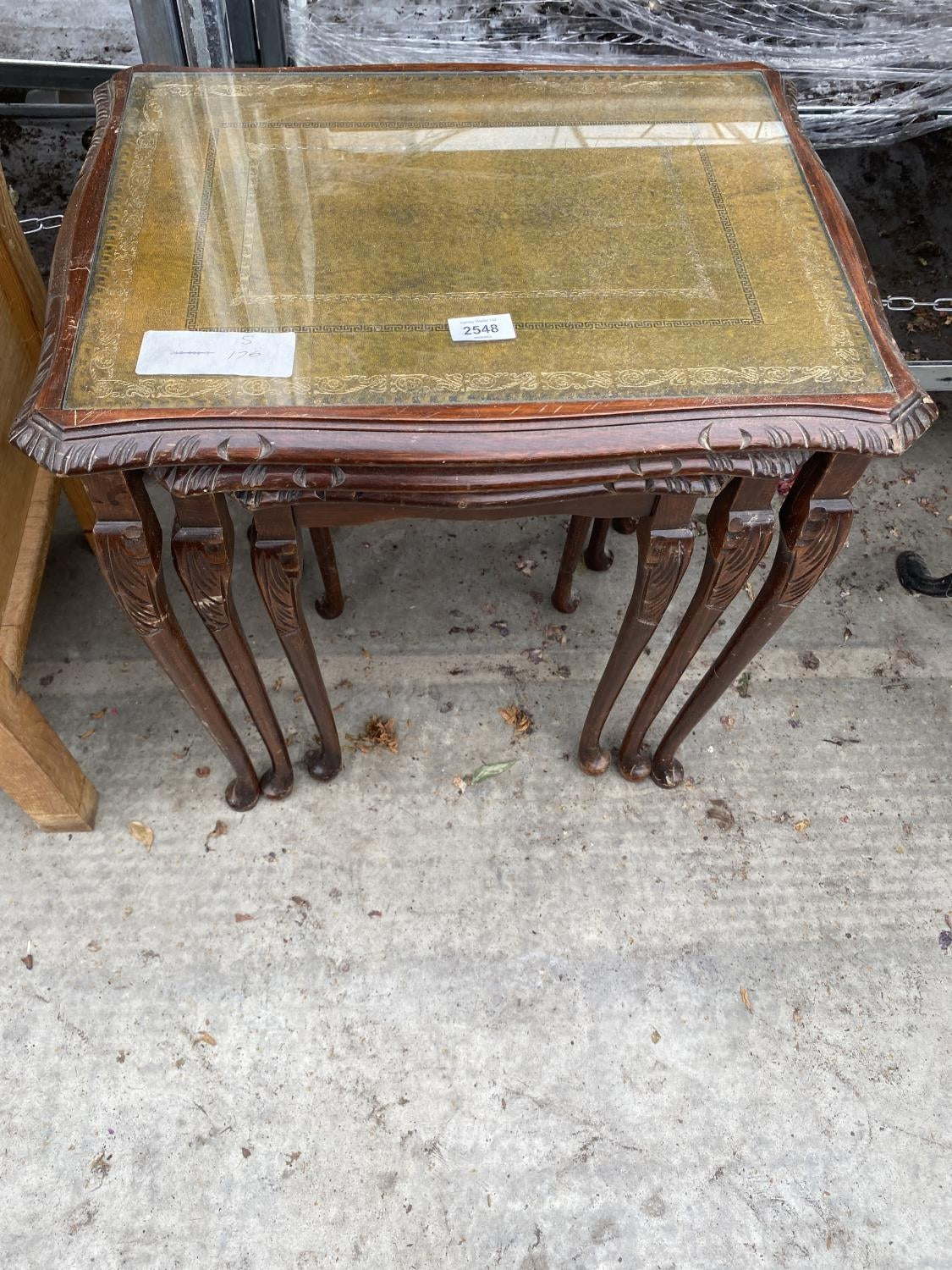 A  NEST OF THREE VINTAGE TABLES ON CABRIOLE LEGS