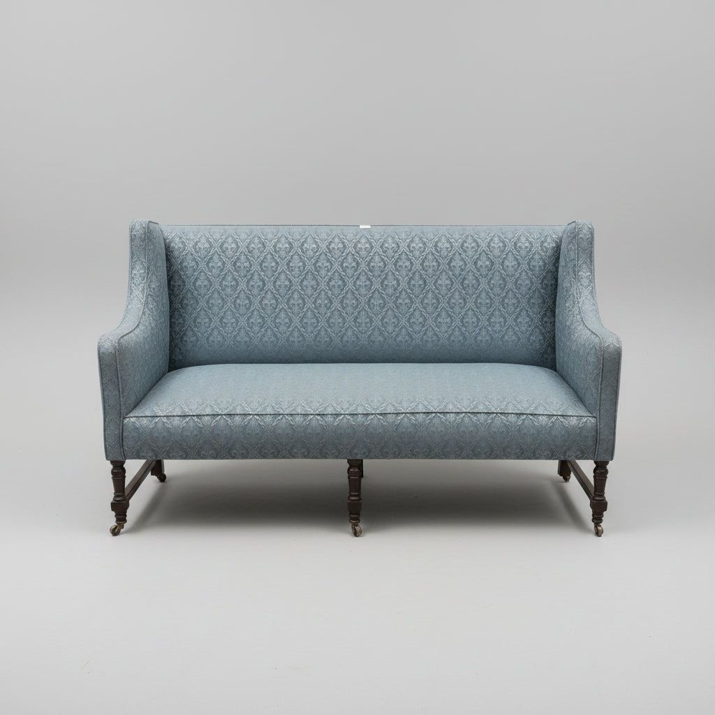 [Pre-Order]Edwardian English sofa, standing on turned mahogany legs, with sprung seat and shaped ands.  Circa 1910