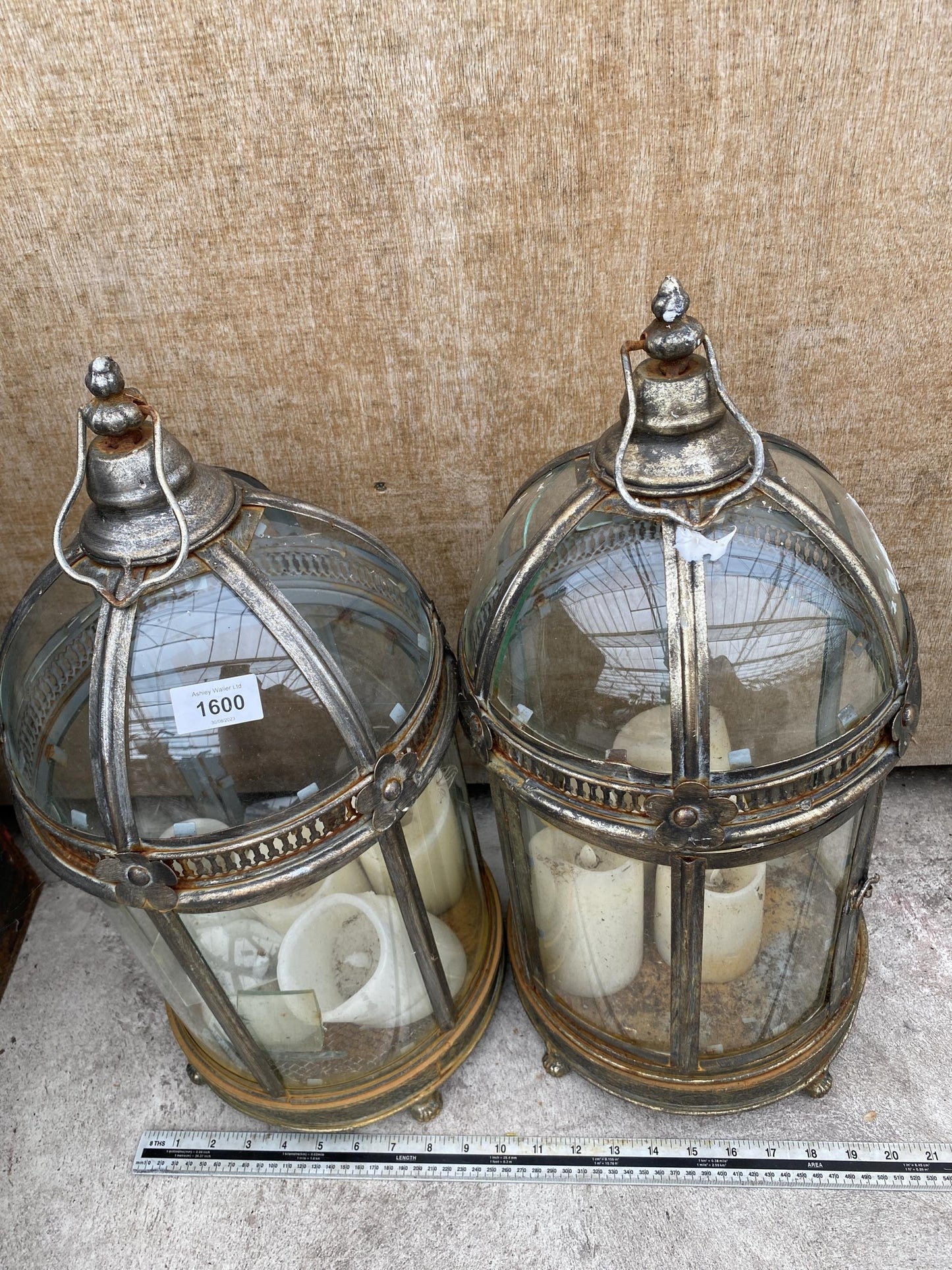 A pair of Georgian style gilt metal storm lanterns, with dome tops, H.47cm