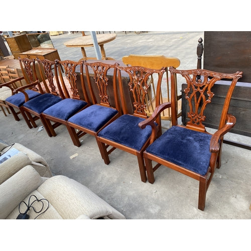 A set of 4 CHIPPENDALE STYLE DINING CHAIRS