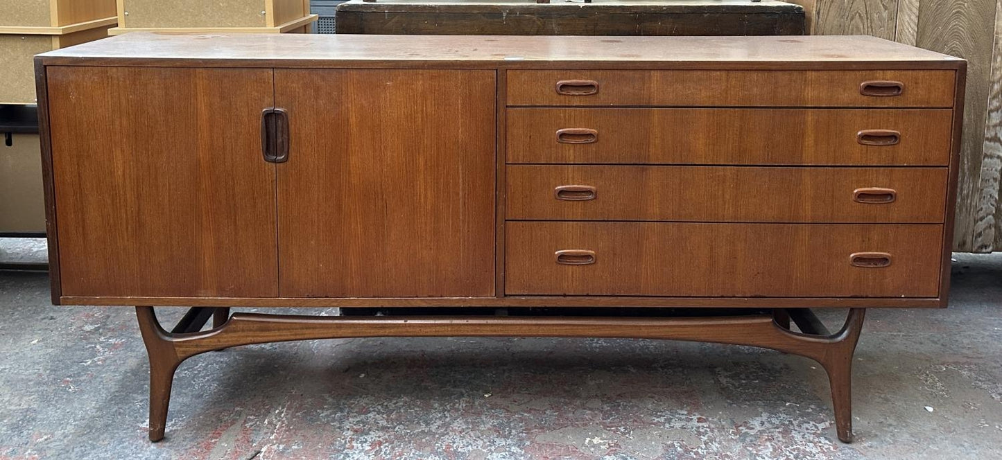 A mid 20th century Greaves & Thomas teak sideboard - approx. 79cm high x 176cm wide x 43cm deep
