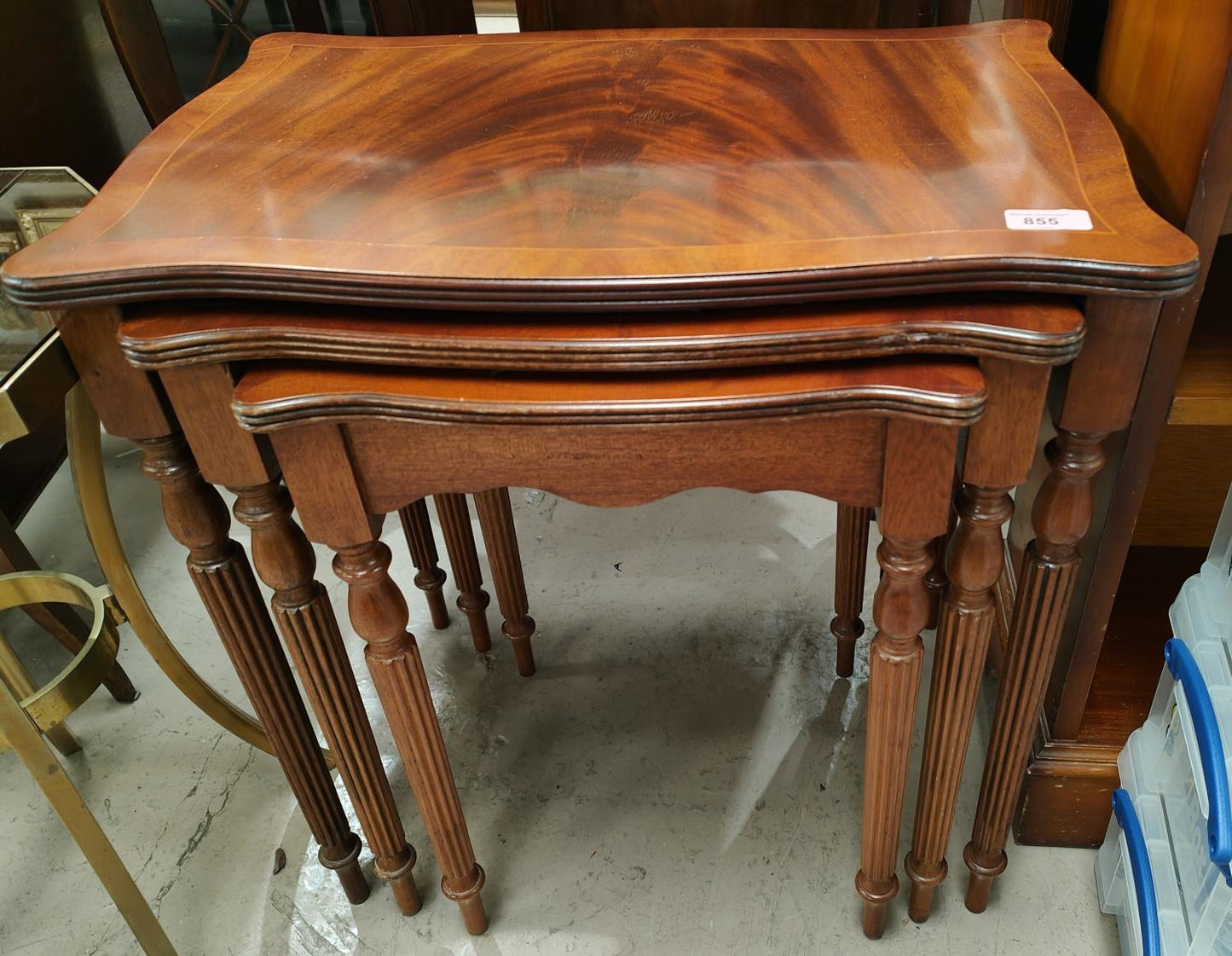 Nest of three inlaid mahogany occasional tables