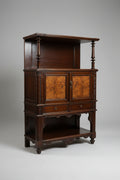 Vintage wooden cabinet with intricate carvings on a dark background