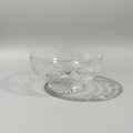 Clear crystal bowl with engraved design on a wooden table, labeled 'Royal Brierley Crystal Bowl'.