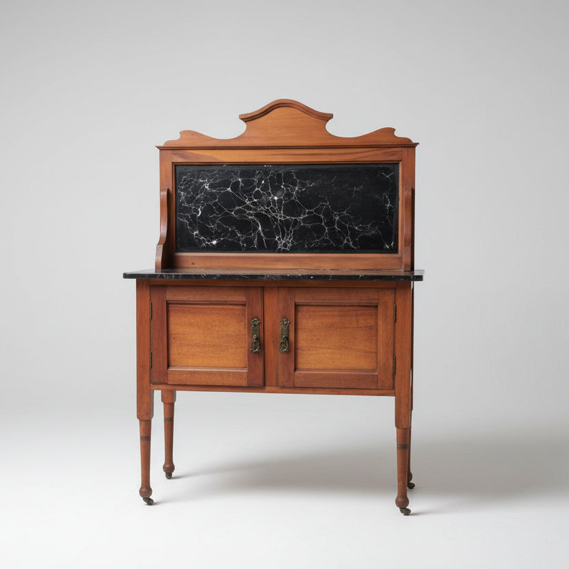 Wooden cabinet with marble top on a red patterned rug, with a chair and Union Jack flag in the background.