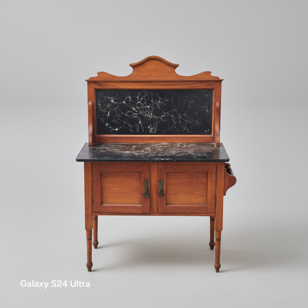 Wooden cabinet with marble top on a patterned rug