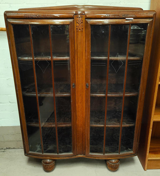 An Charming OAK double bow fronted display cabinet with carved decoration