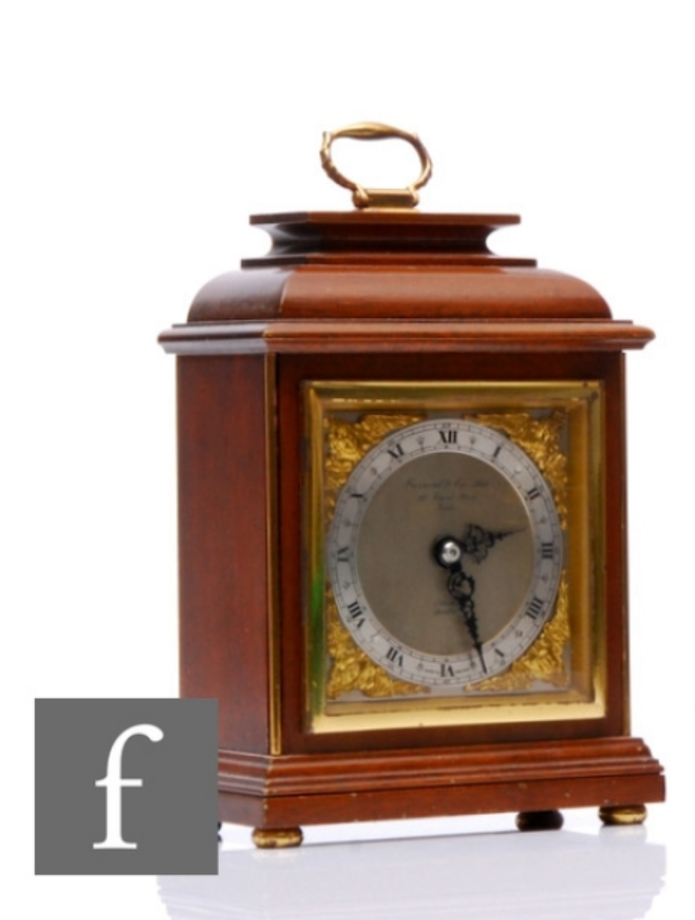 Small Elliott clock retailed by Garrard & Co London, height 20.5cm