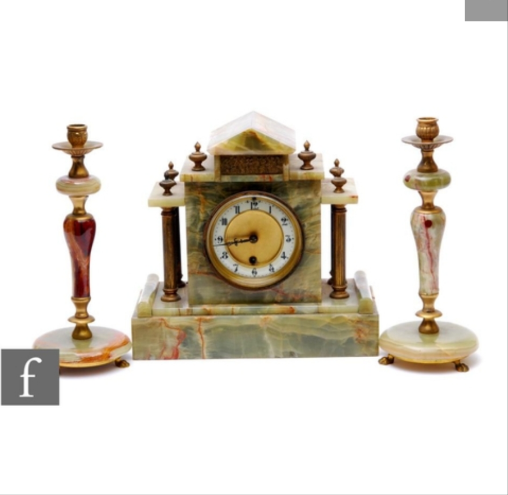 20th Century French onyx clock garniture of architectural form