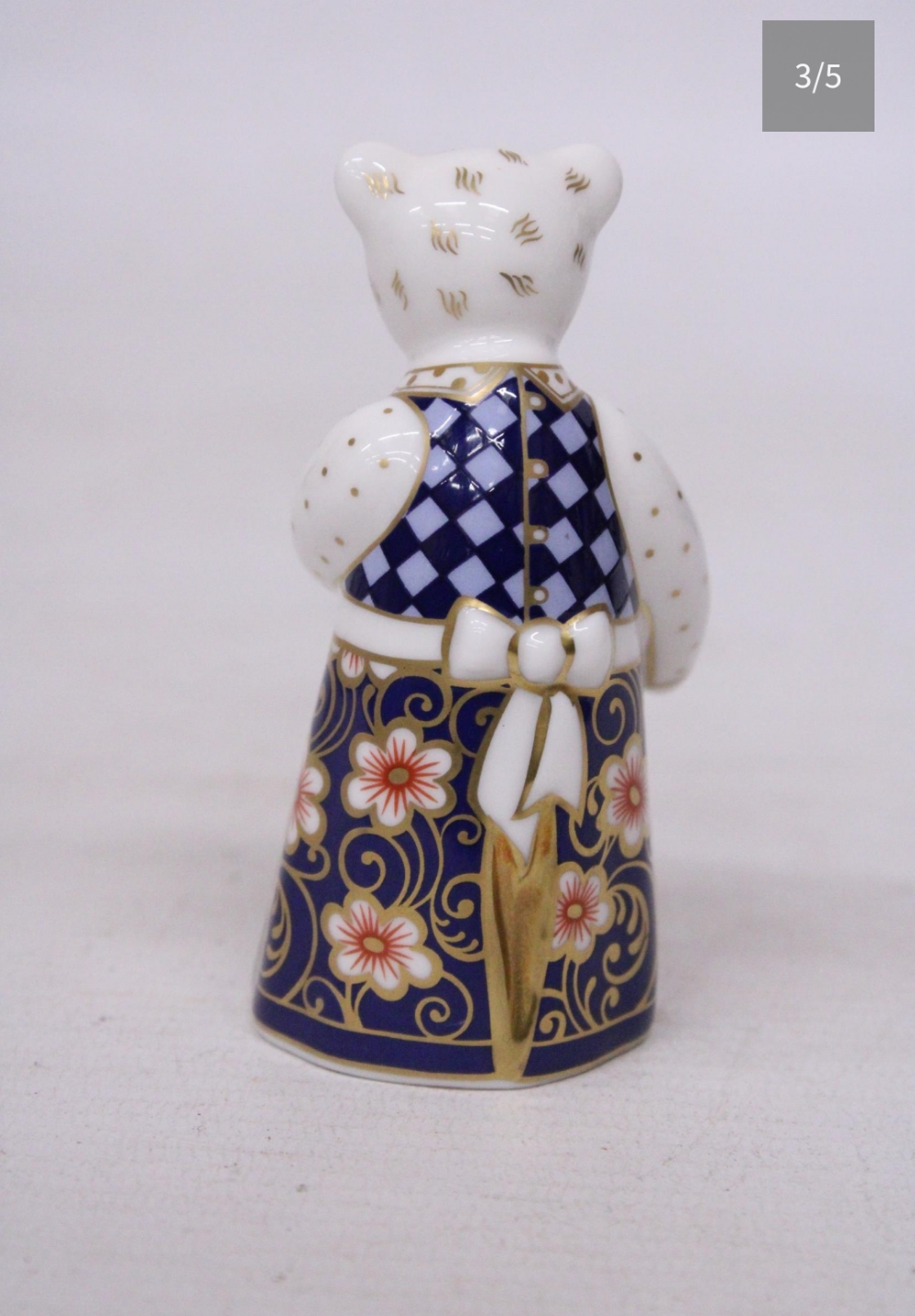 A ROYAL CROWN DERBY Handpainted figurine  collection