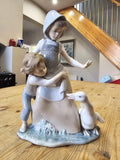 Lladró "Avoiding the Goose" figurine (Model #5033)