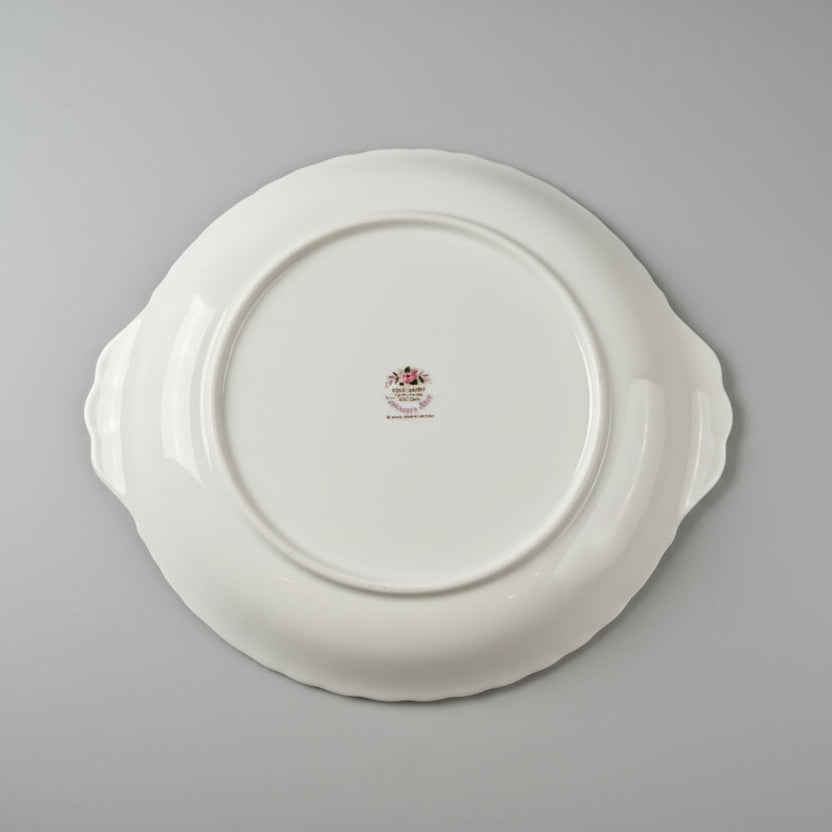 Set of decorative plates on a wooden surface