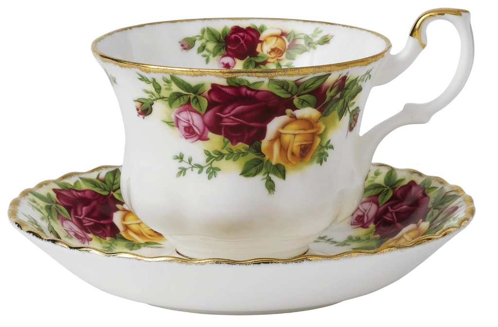 A vintage Royal Albert Old Country Roses tea cup and saucer set with floral patterns on a white background.