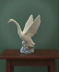 NAO by Lladro  Porcelain figurine of a swan with its wings raised