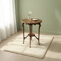 AN EDWARDIAN TWO TIER CENTRE TABLE WITH PIE-CRUST EDGE