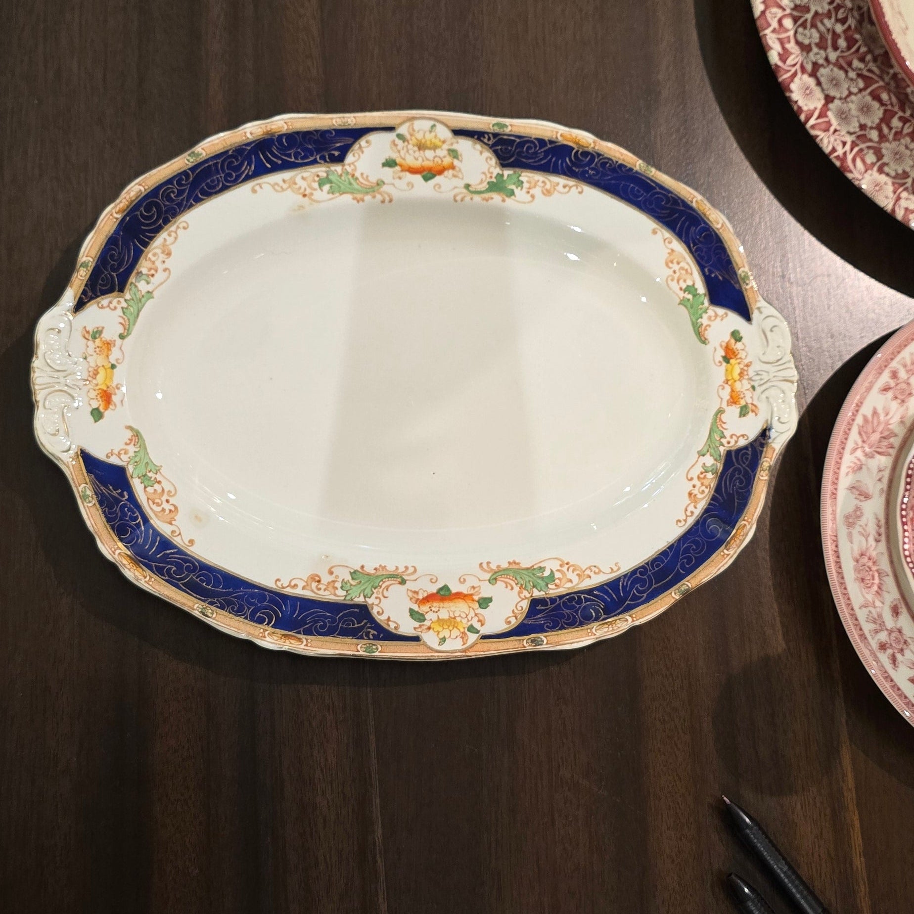 This is an Alfred Meakin oval serving platter in the Caledonia (Scalloped) pattern