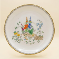 Decorative plate with floral design on a beige background