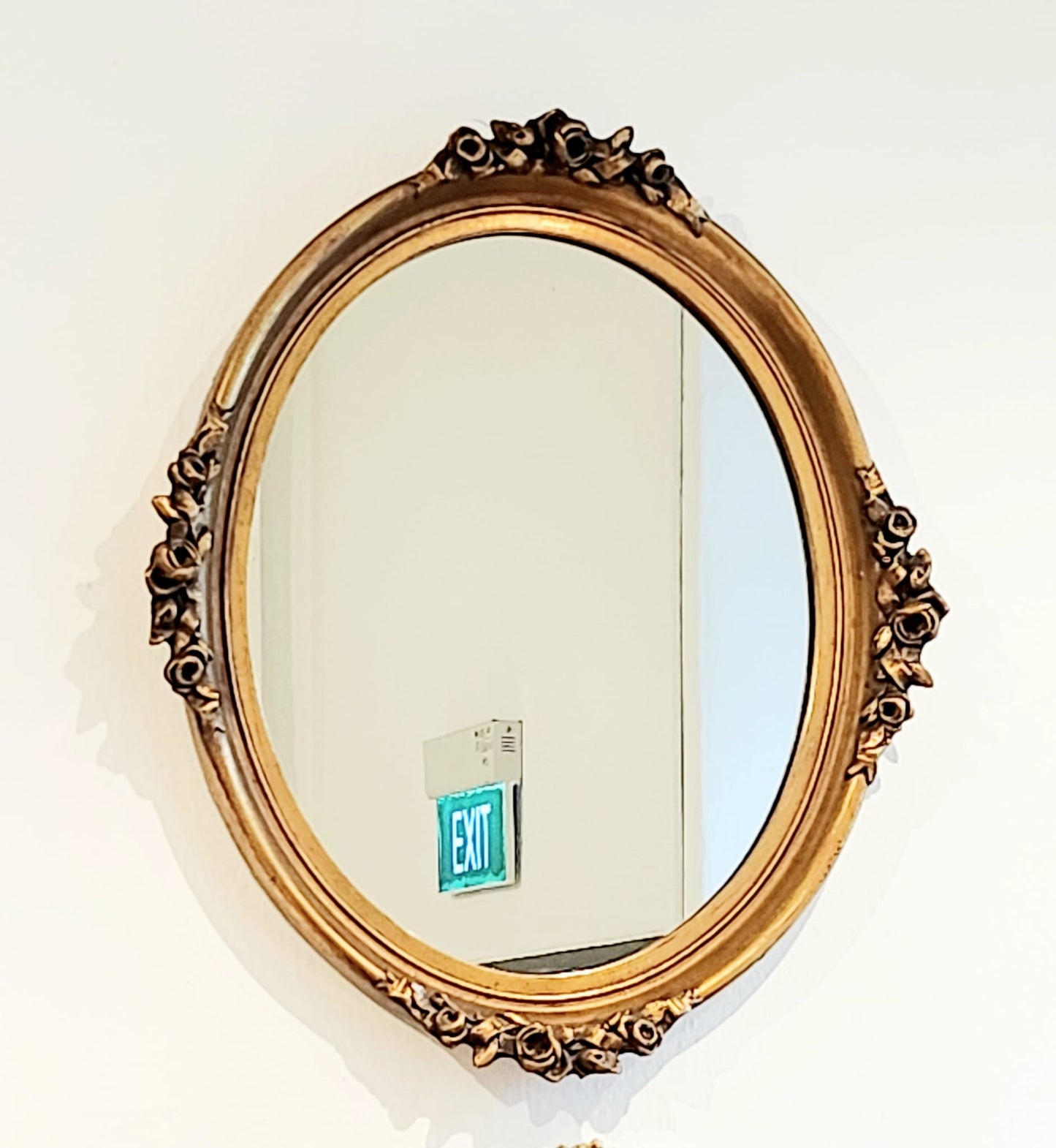 Victorian mirror with rose design 