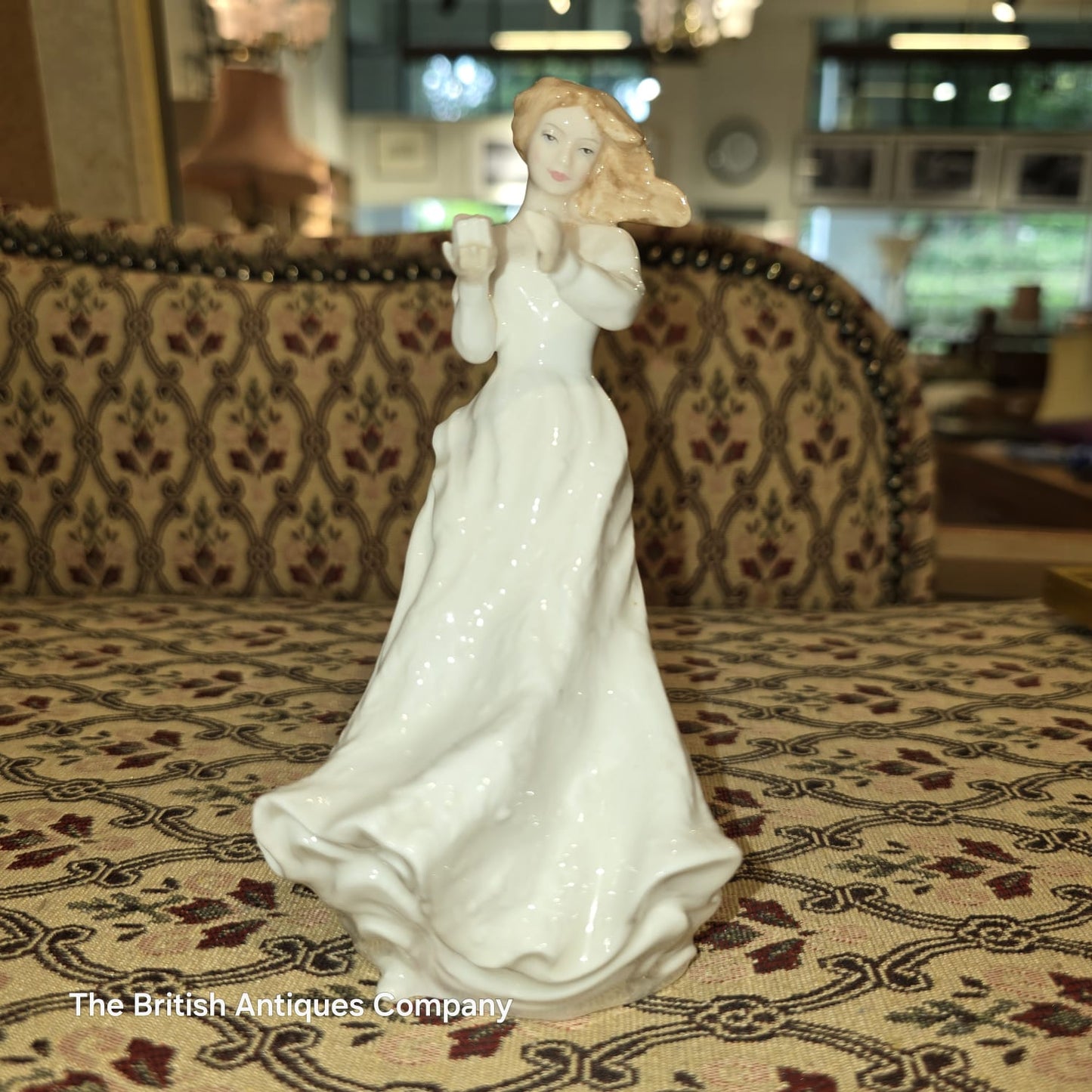 Elegant Porcelain Figurine of a Lady with Flowing Hair