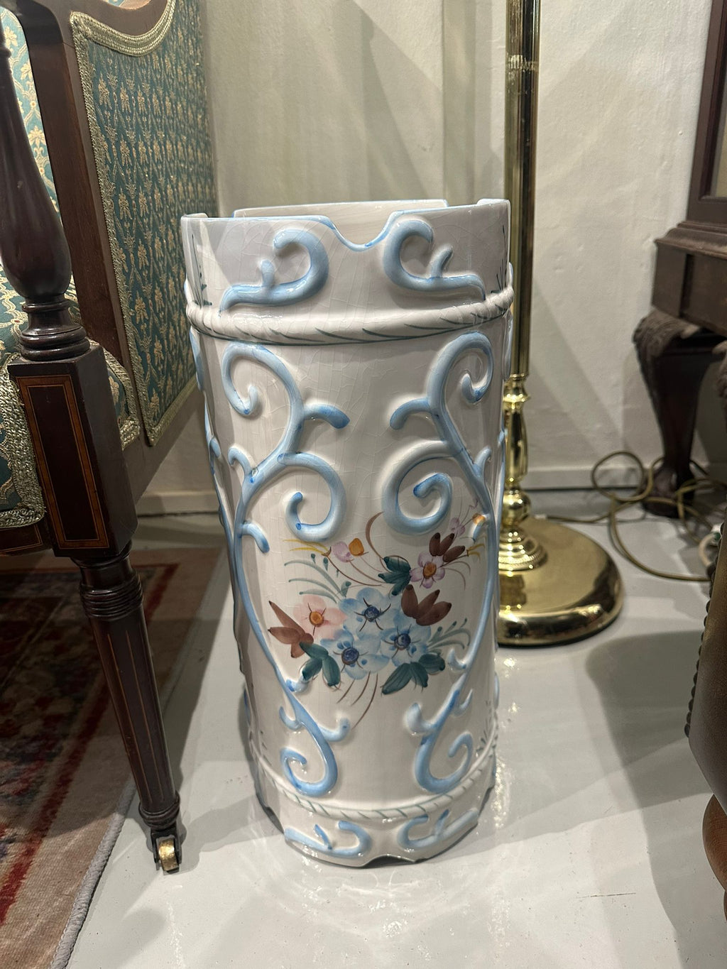 Vivid blue-and-white colors and the Floral & Scroll Umbrella Stand