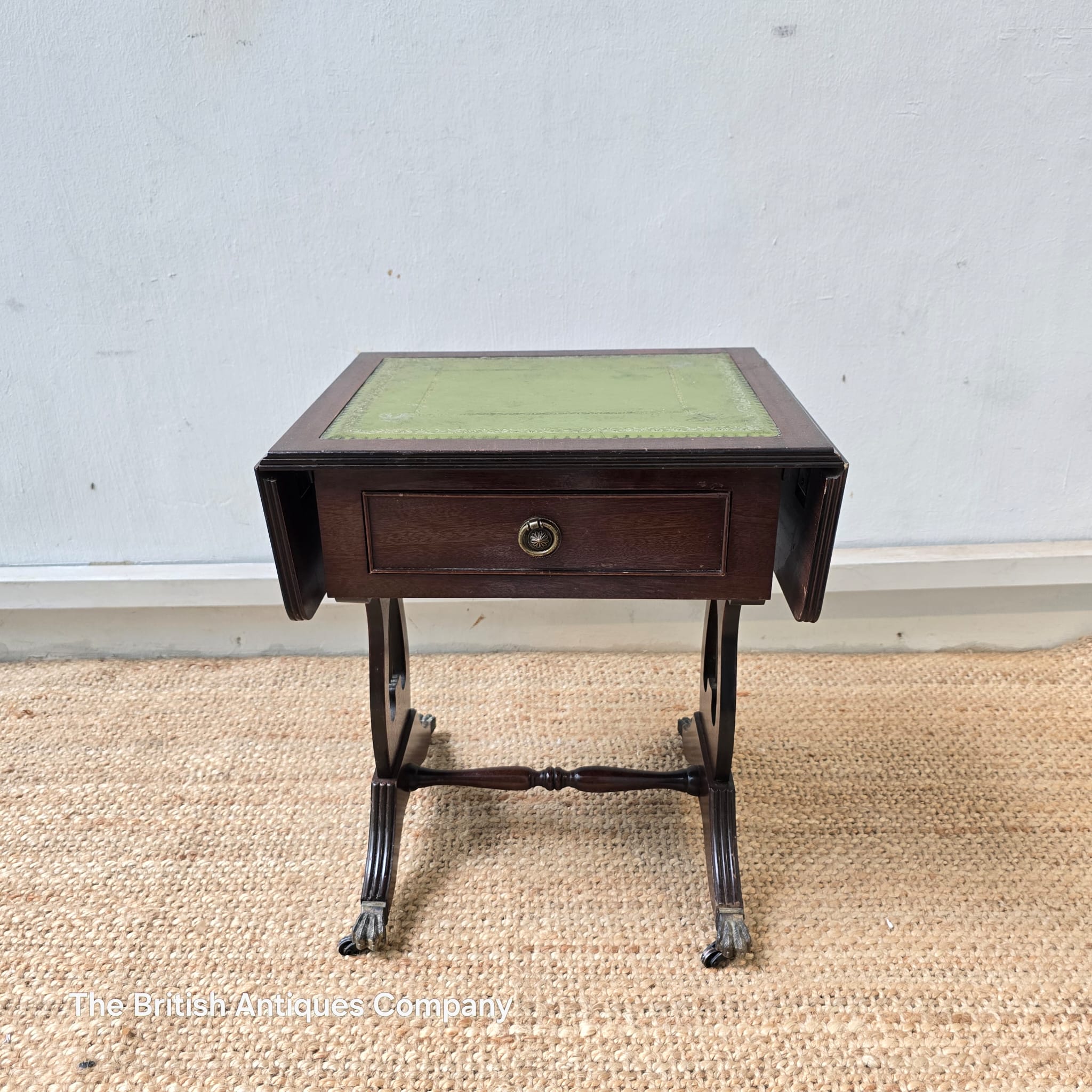 Bevan Funnell mahogany extending side table with a green leather top