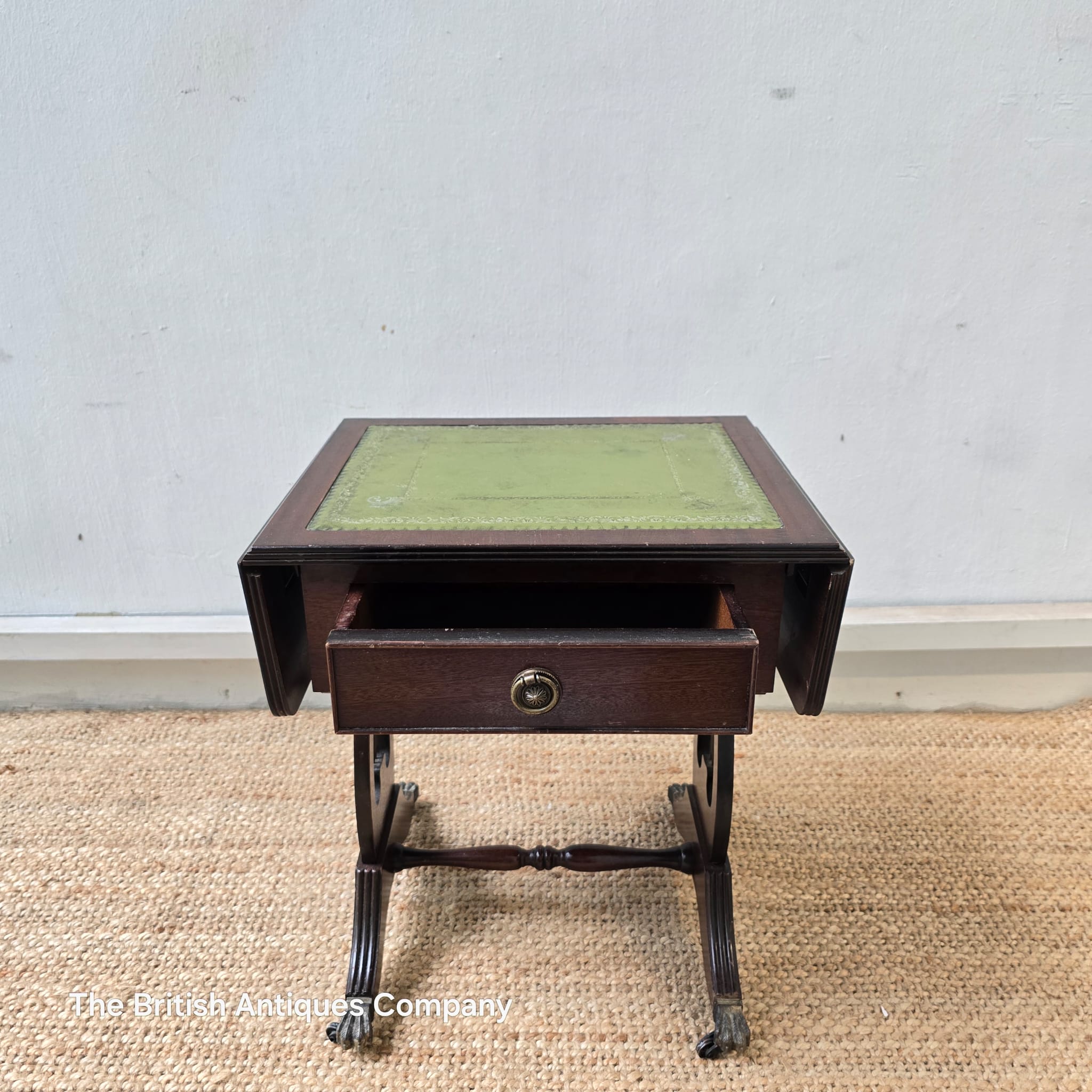 Bevan Funnell mahogany extending side table with a green leather top