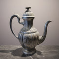 Antique Rococo-Style Silver-Plated Coffee Pot with Floral Repoussé Details