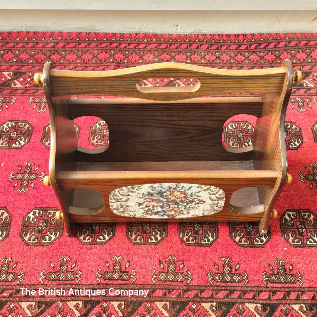 AN ELM MAGAZINE RACH WITH TAPESTRY PANEL