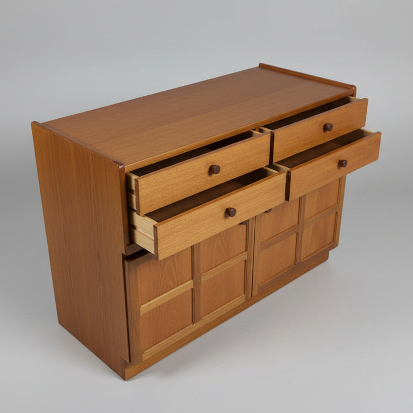 Wooden dresser with multiple drawers on a gray background