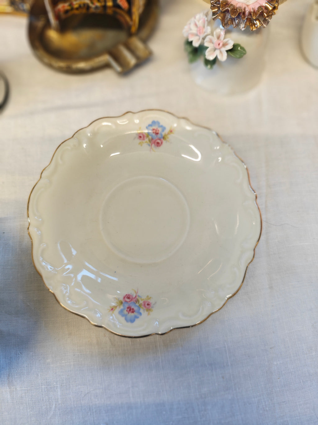 Vintage Bavarian embossed pedestal-foot tea cup and saucer