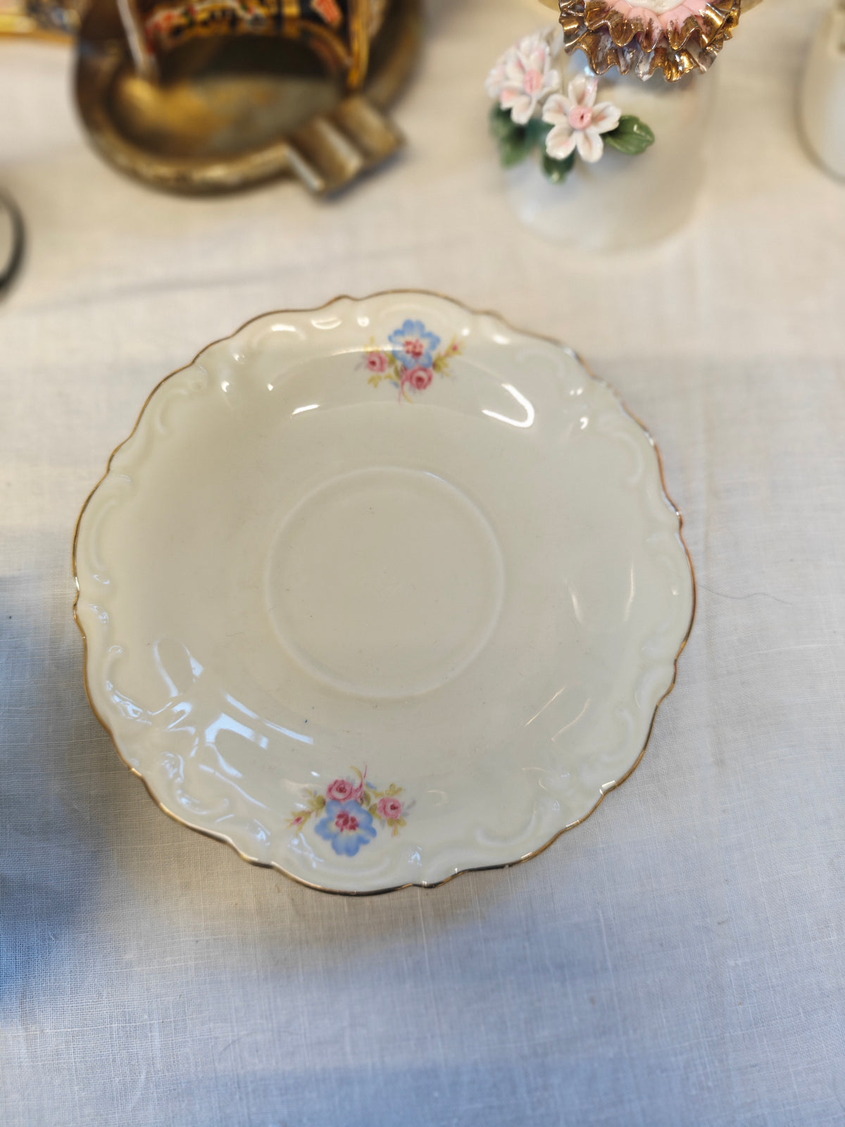 Vintage Bavarian embossed pedestal-foot tea cup and saucer