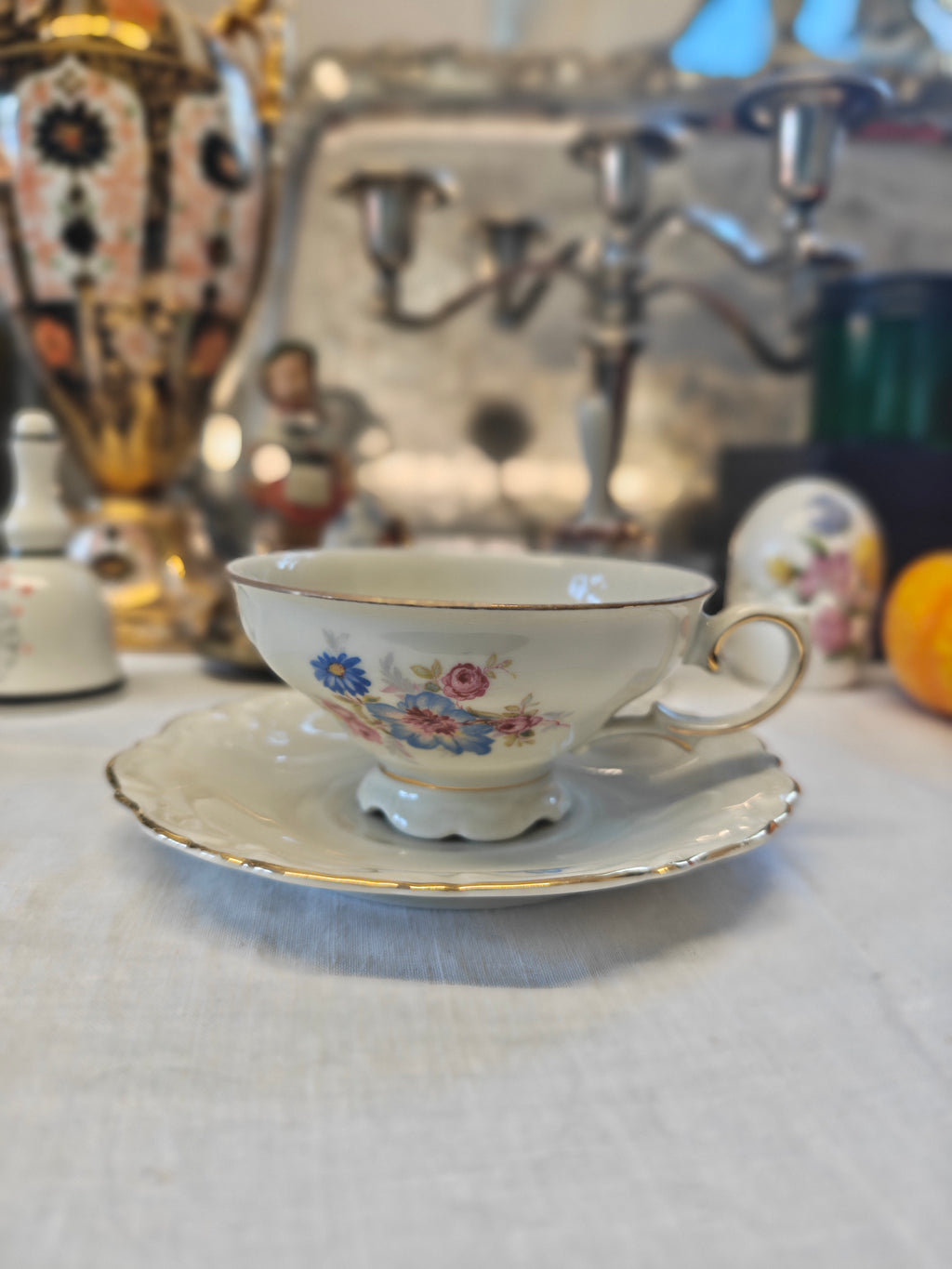 Vintage Bavarian embossed pedestal-foot tea cup and saucer