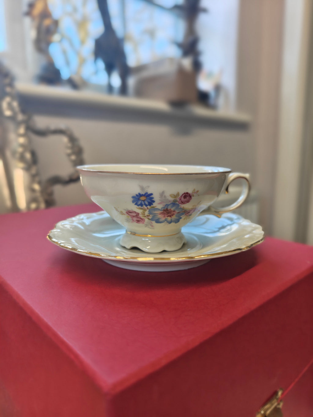 Vintage Bavarian embossed pedestal-foot tea cup and saucer