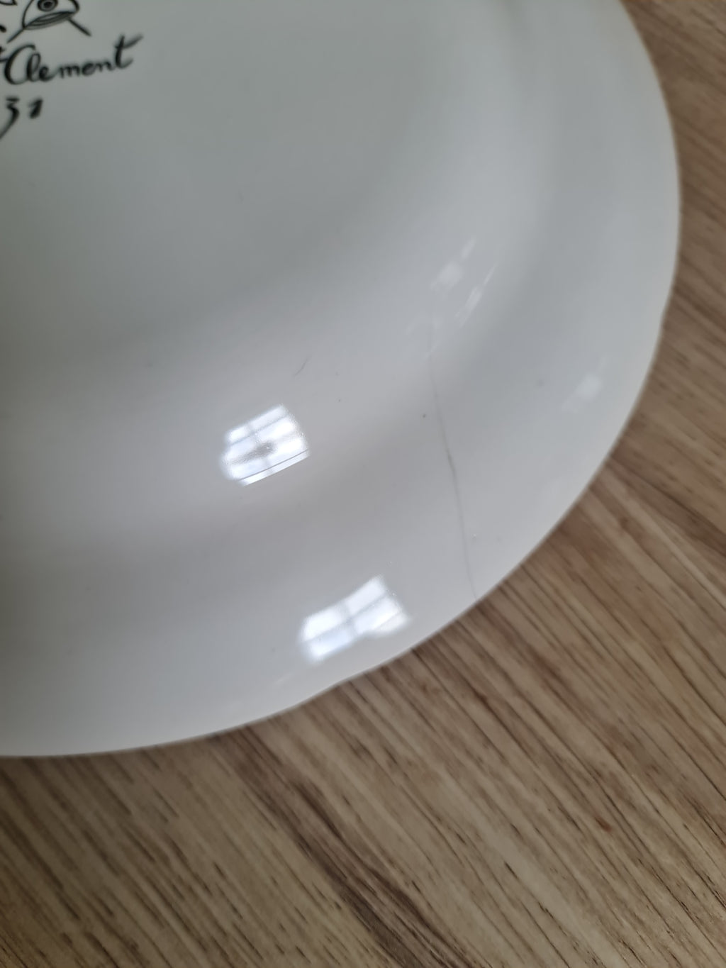 French potter St. Clement, a French Revolution themed plate. Small cracks line on plate