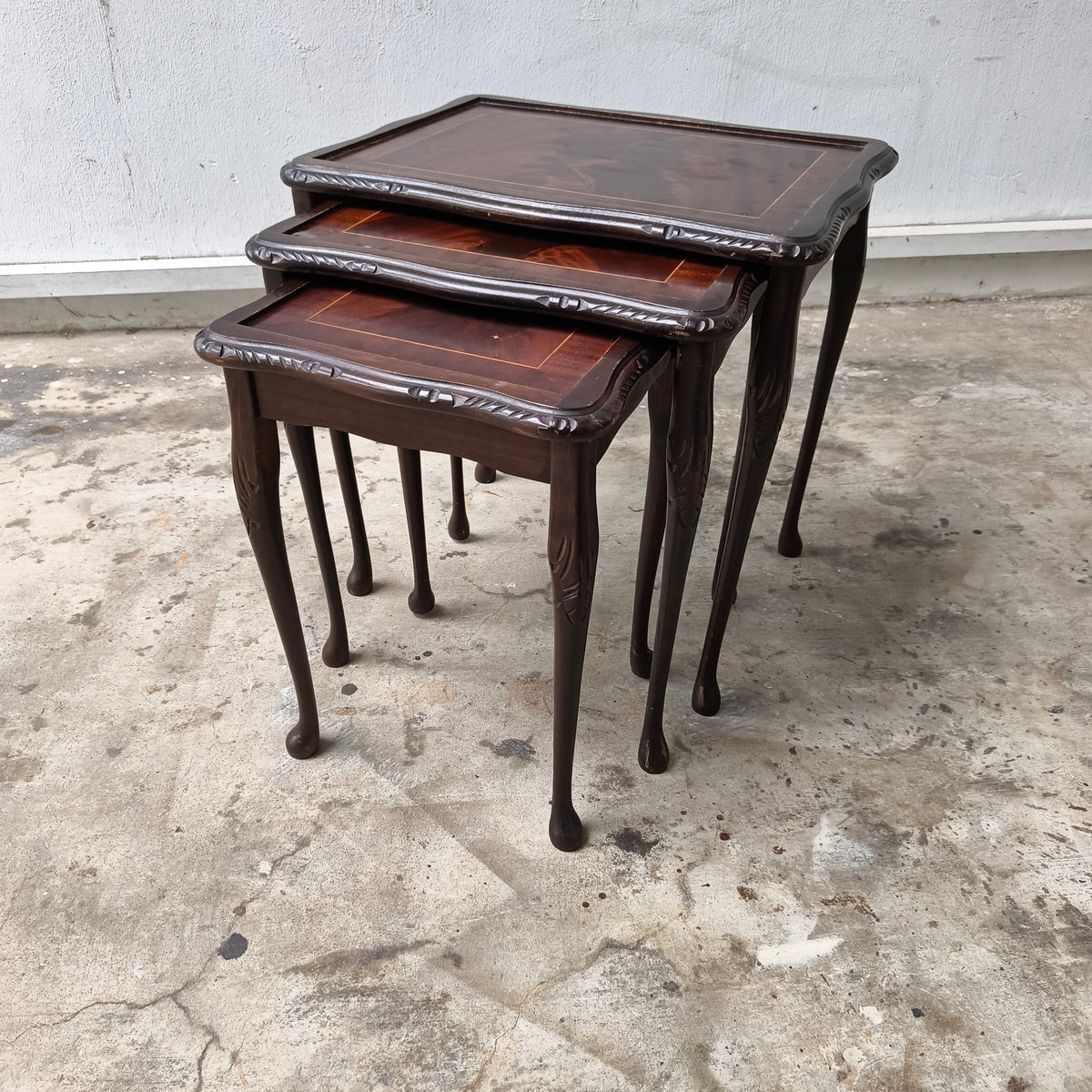 Circa 1910 Edwardian Queen Anne Revival Flame Mahogany Nesting Tables