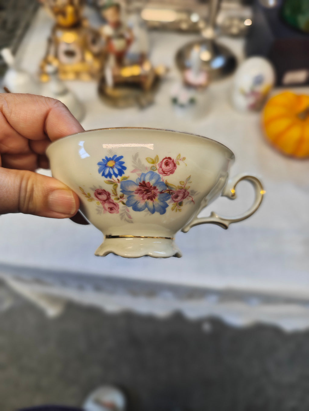Vintage Bavarian embossed pedestal-foot tea cup and saucer