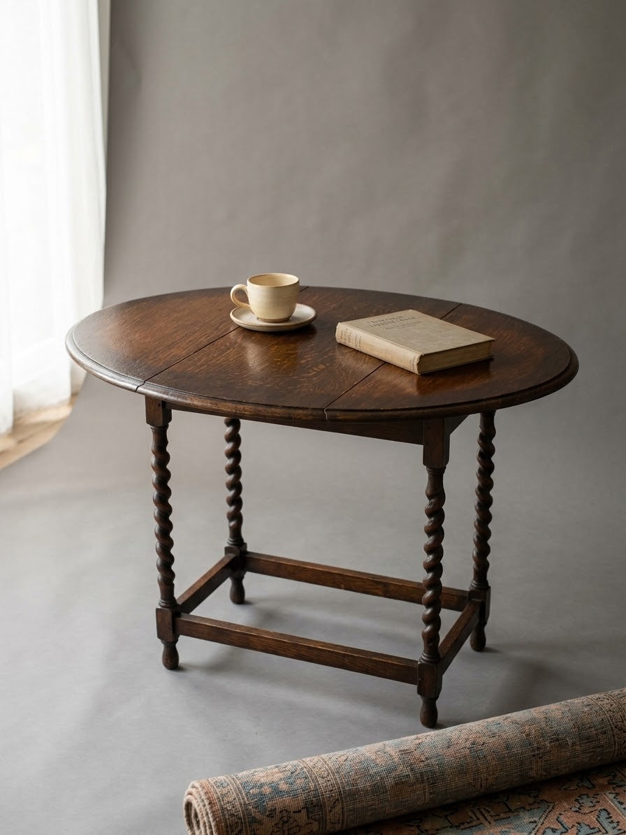 Vintage oak Jacobean-style drop-leaf table 1900-1910